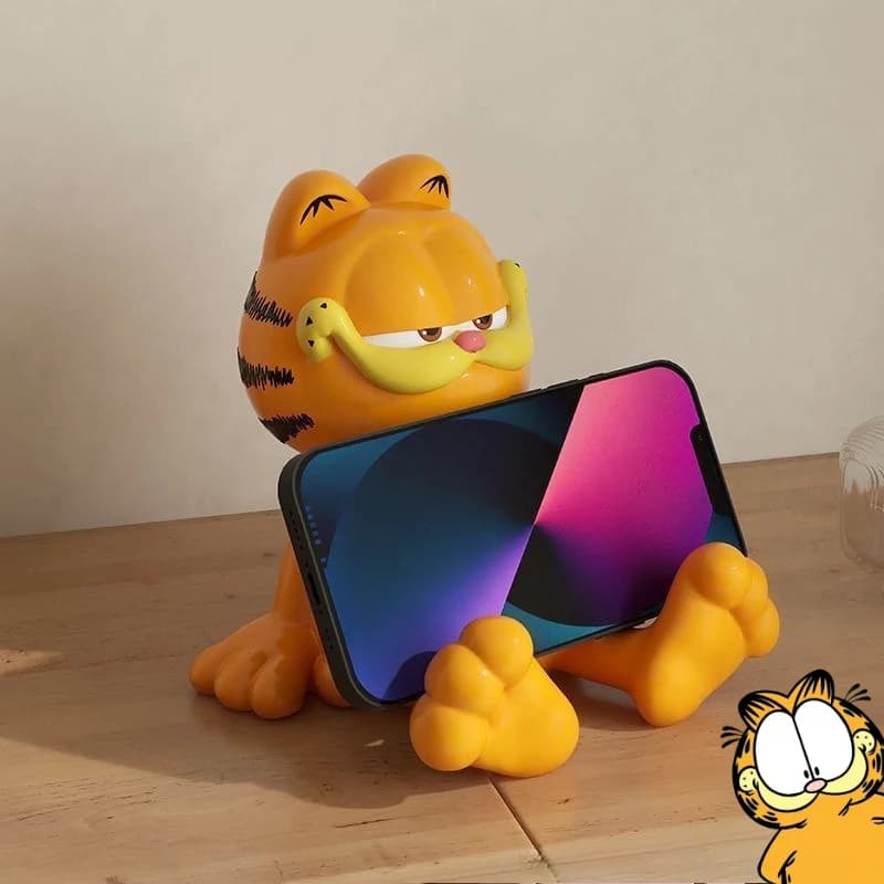 Peluche Garfield, simpatico personaggio dei cartoni animati, statuetta kawaii multifunzionale, supporto per telefono da scrivania per casa, ufficio e studenti, decorazione, vendita all'ingrosso.