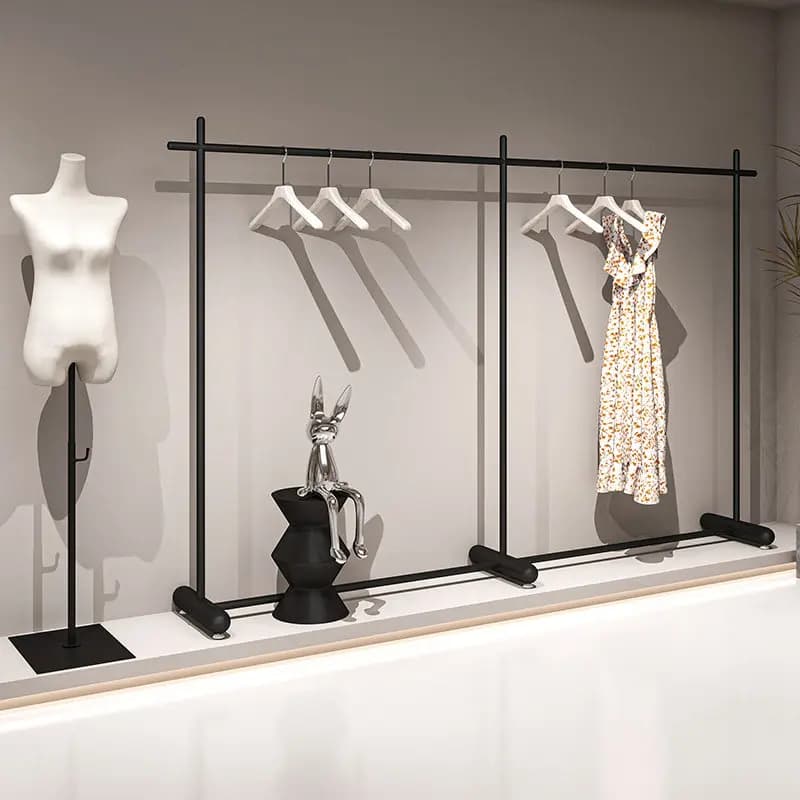 Black wrought iron ground hanger for clothing store, clothes display