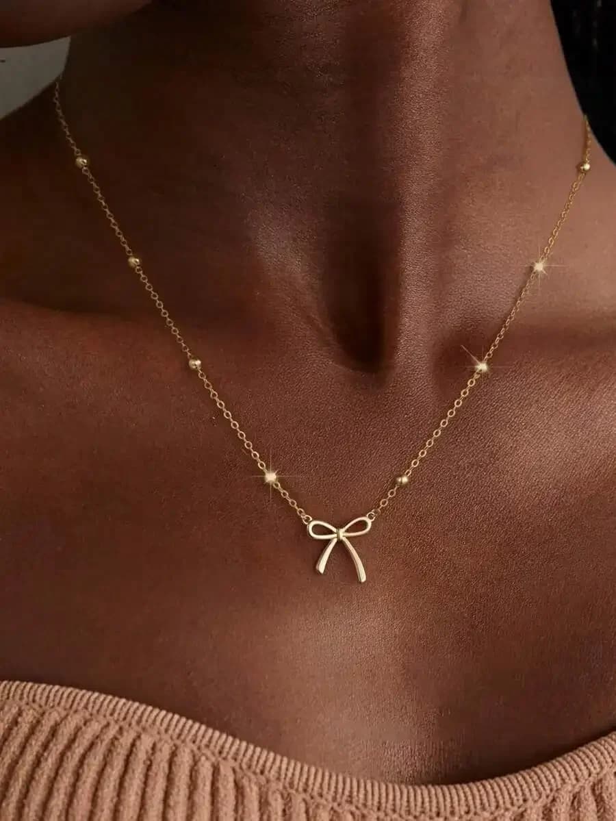 Collana Minimalista con Ciondolo a Fiocco e Catena di Perline per Donne