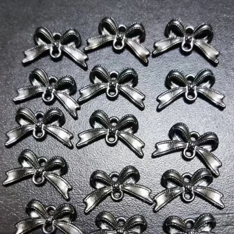 Gun black alloy bow pendant DIY handmade beaded material metal bow tie pendant bracelet accessories
