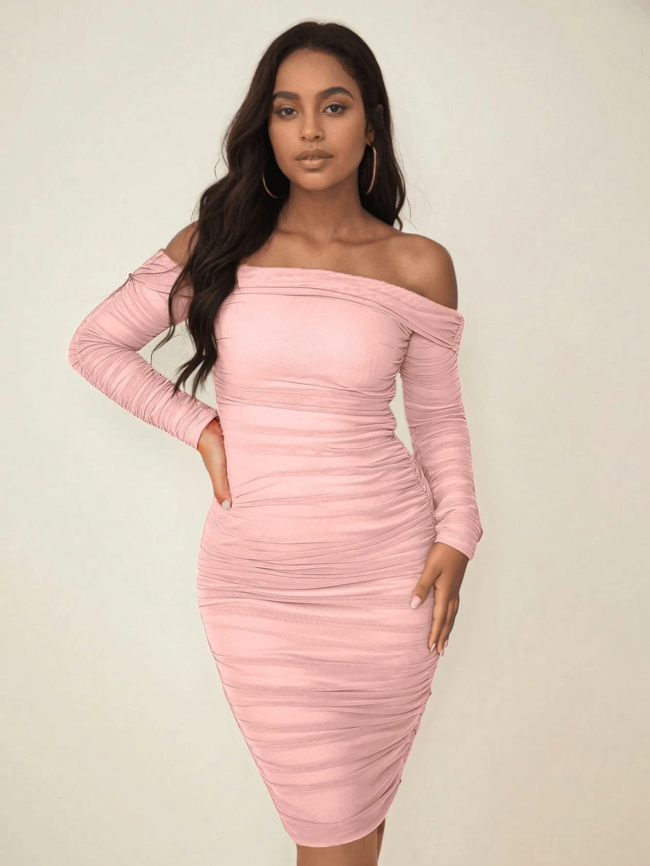 Spring new arrival: Pink off-the-shoulder ruched bodycon dress with mesh long sleeves and a short, fitted skirt.