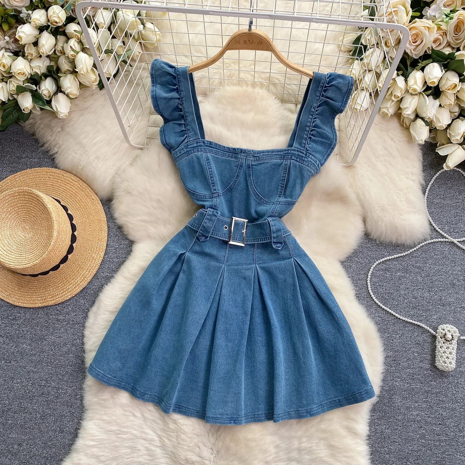 Korean version of the dress laced with soft flying cuffs in college style. Retro dress in denim with square neck and belt for women in summer
