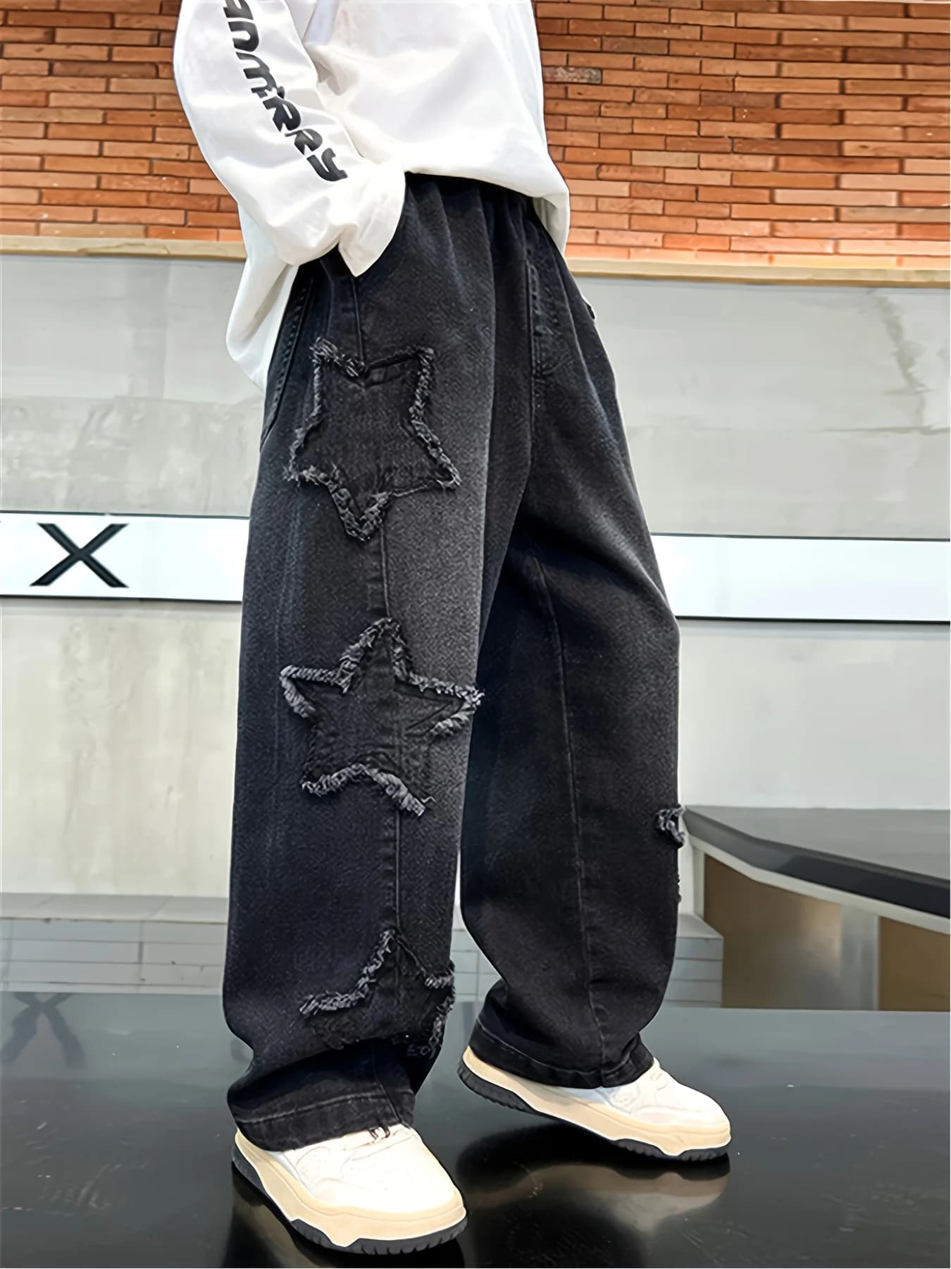 Jeans neri ricamati a cinque stelle da ragazzo, abbigliamento casual per giovani, adatti a tutte le stagioni, vita completamente elastica.