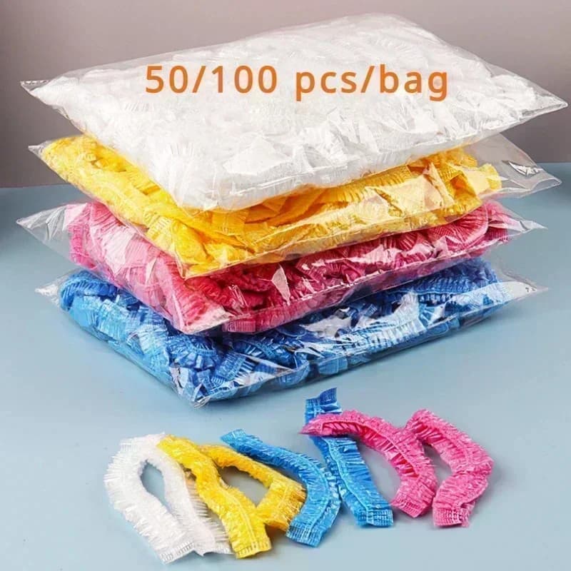 50/100PCS Cuffia da doccia usa e getta in plastica elastica addensata 42 centimetri copricapo impermeabile per salone spa tintura per capelli donna cuffia elastica per capelli