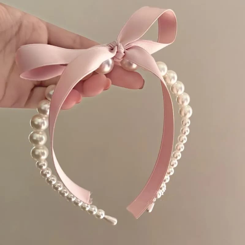 Ragazza come fascia per capelli con perle e fiocco rosa francese, fascia per capelli con fermaglio per capelli di fascia alta e temperamento dolce