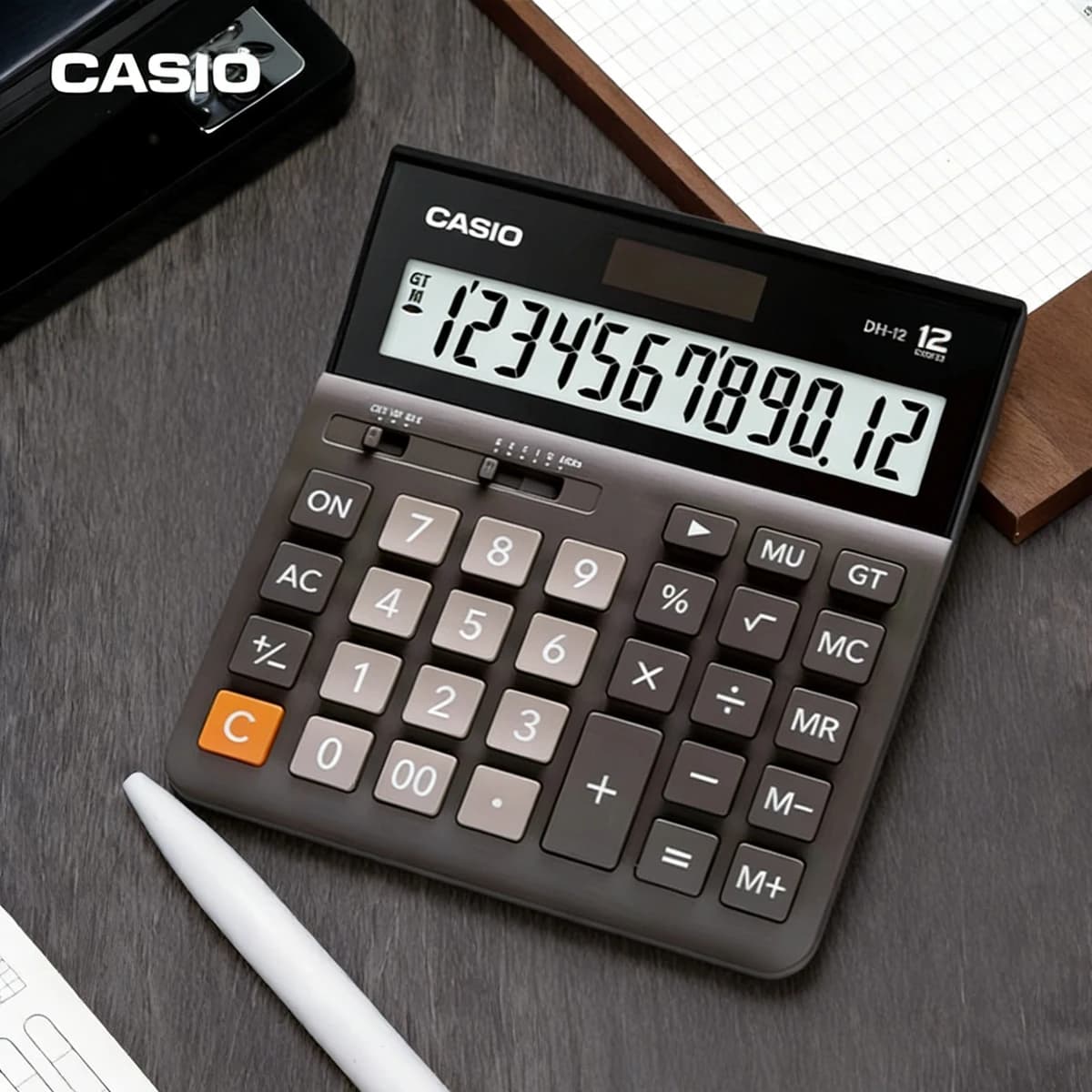 Calcolatrice solare Casio MH-12 con tasti grandi per ufficio, ideale per finanza, risorse umane, banche, supermercati, cartolerie e altro.