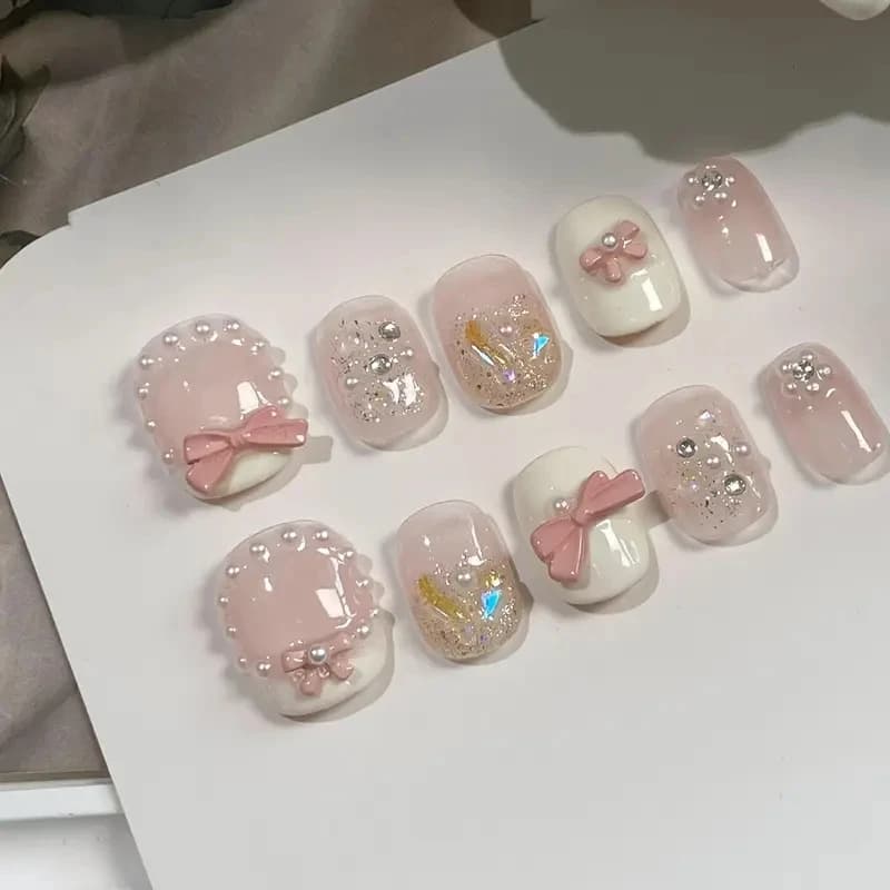 Handmade fake nails with short and cute 10 piece high-end lightweight luxury bow, decorative patch for cute style girl nails