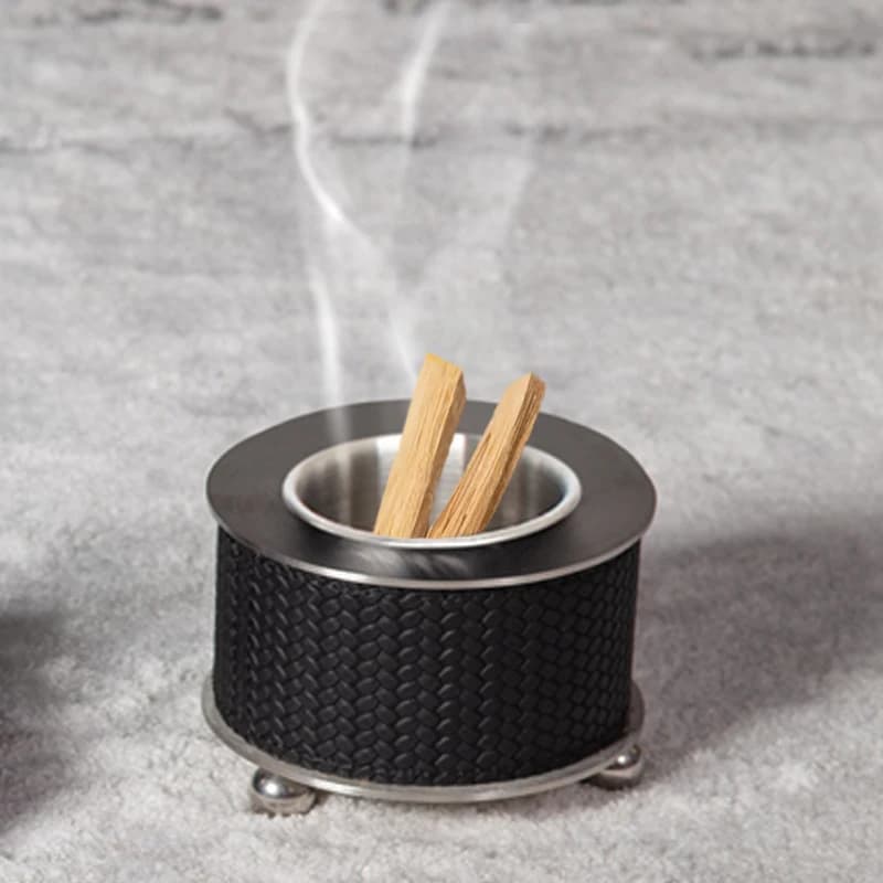 Bruciatore di incenso rotondo in pelle a prezzo di fabbrica con base in metallo Bruciatore di incenso scavato Piccolo arredamento artigianale in metallo