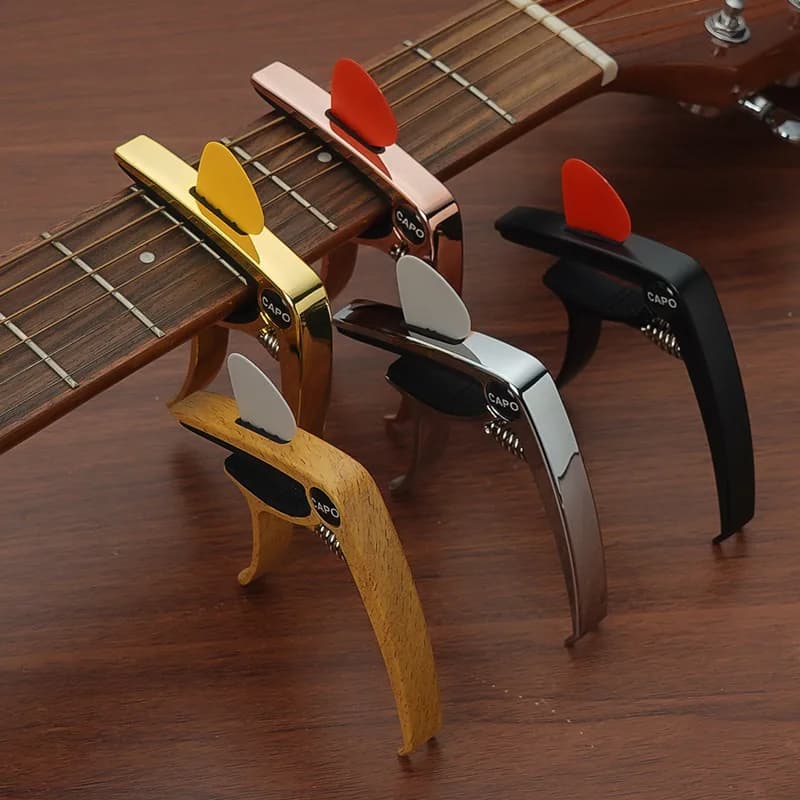 3-in-1 Eccellente metallo Capotasto per chitarra Clip di regolazione Capotasto per chitarra per chitarre elettriche acustiche Basso Ukulele con supporto per plettri 1 PC