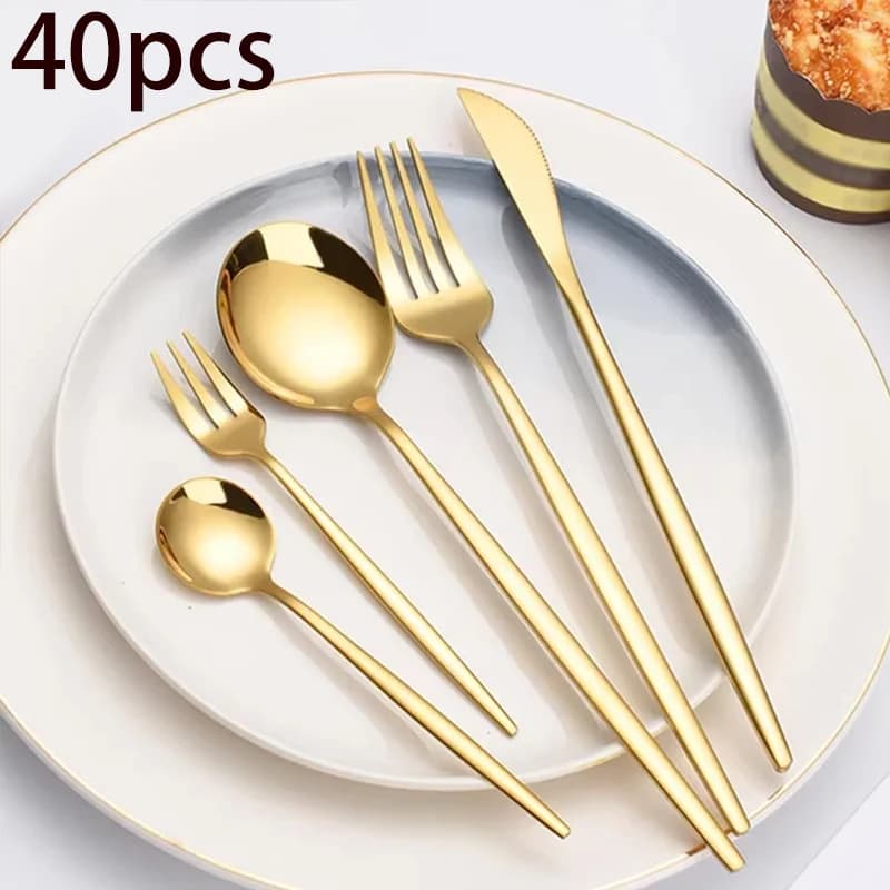 Set of 40-piece stainless steel cutlery, dessert forks and gold-colored luxury fruit, dessert spoon, knife and kitchen fork.
