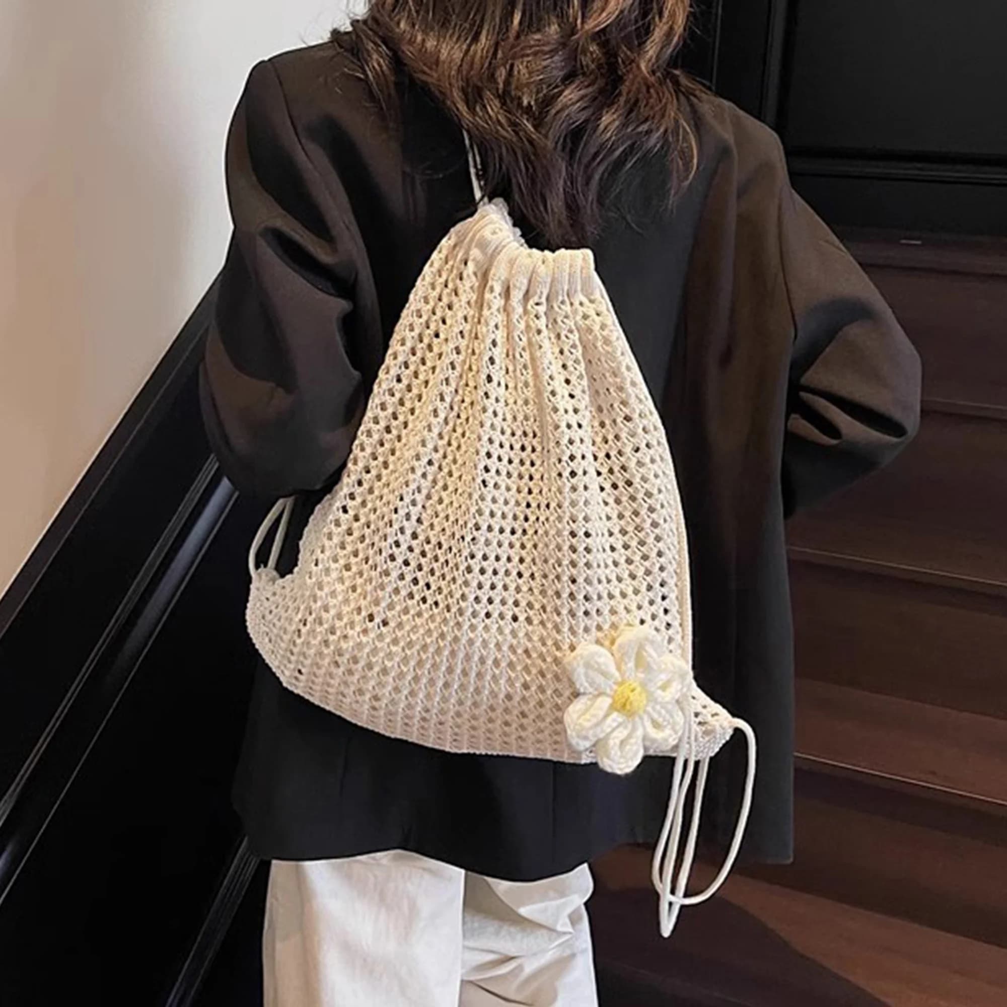 Elegant floral backpack with 3D floral design. Spacious bag with fabric shoulder strap, ideal for everyday outdoors
