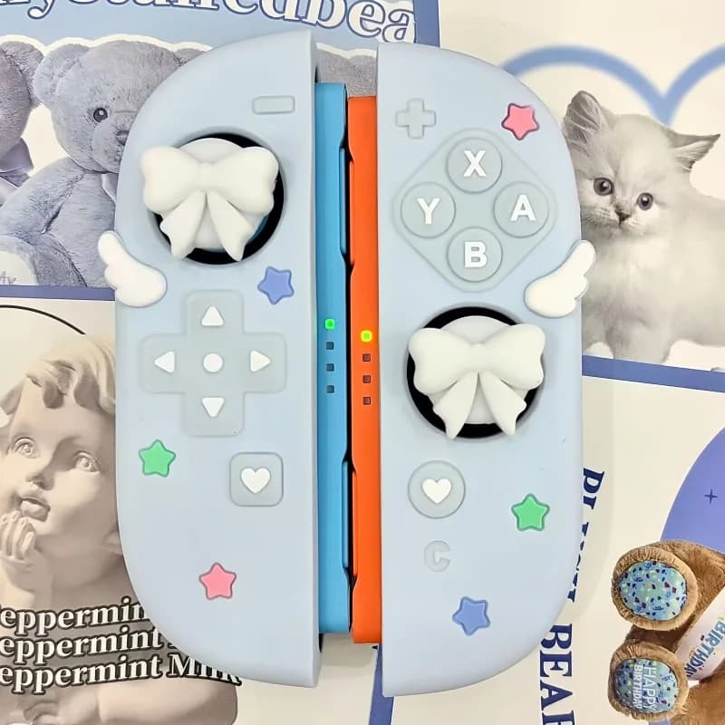 Nuova custodia protettiva staccabile in silicone con ali a stella e copri joystick a forma di fiocco per controller Joy-Con NS per Nintendo Switch 2 OLED