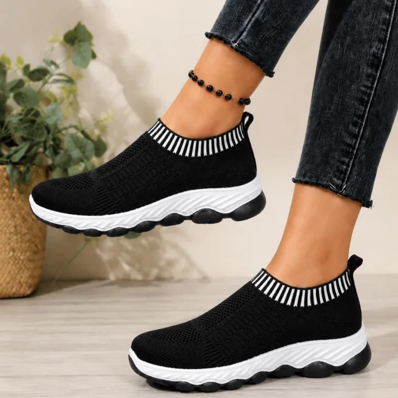 Sneakers slip-on in maglia traspirante grigia da donna, scarpe leggere e comode con suola ondulata ammortizzata