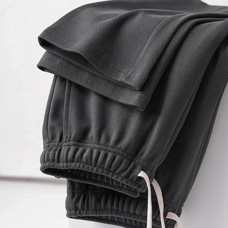 Pantaloni della tuta da uomo primavera autunno moda coreana abbigliamento sportivo con coulisse gamba larga pantaloni dritti pantaloni larghi Casual in cotone
