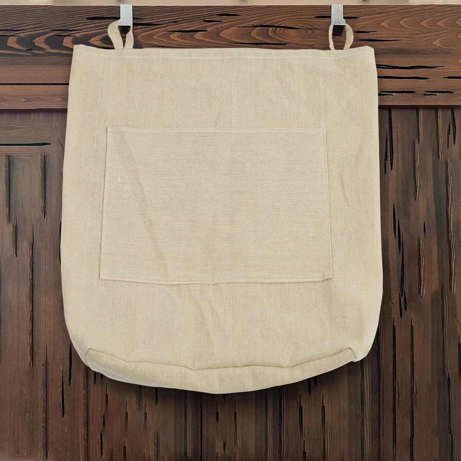 Hanger basket bag with zipper over the dirty laundry door, organizer to store socks for the bathroom, space saving