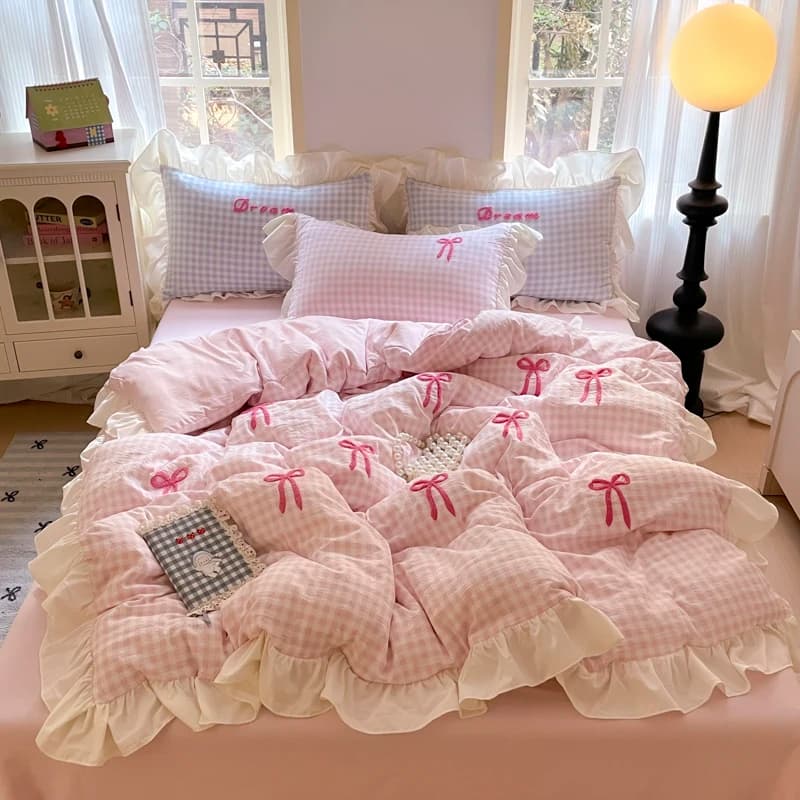 Set di biancheria da letto in stile coreano 2025 Copripiumino con fiocco a griglia rosa Set di lenzuola romantiche Copripiumino per camera da letto per donna e ragazza 4 pezzi