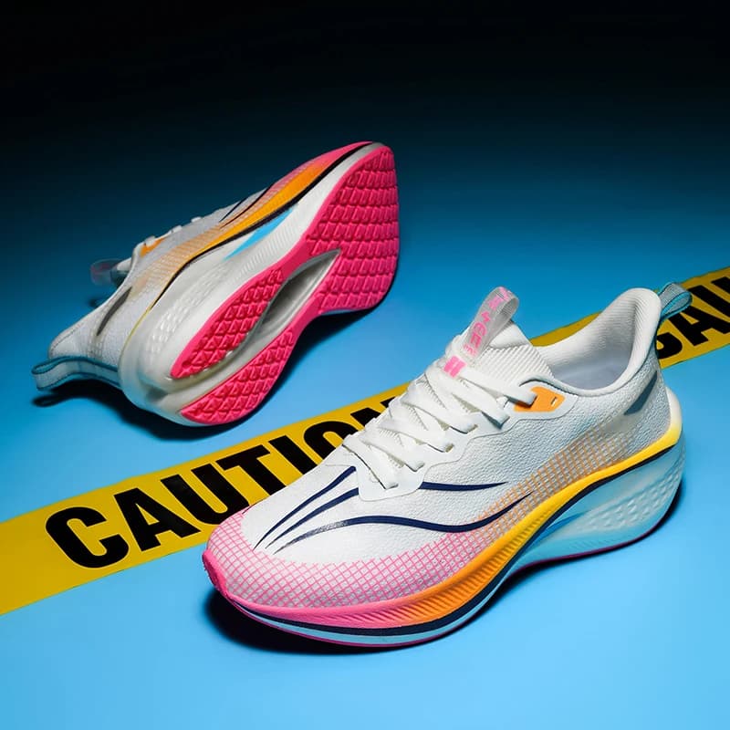 Scarpe da corsa professionali con corpo leggero, ammortizzazione a rimbalzo, suola antiscivolo adatta per corsa a lunga distanza
