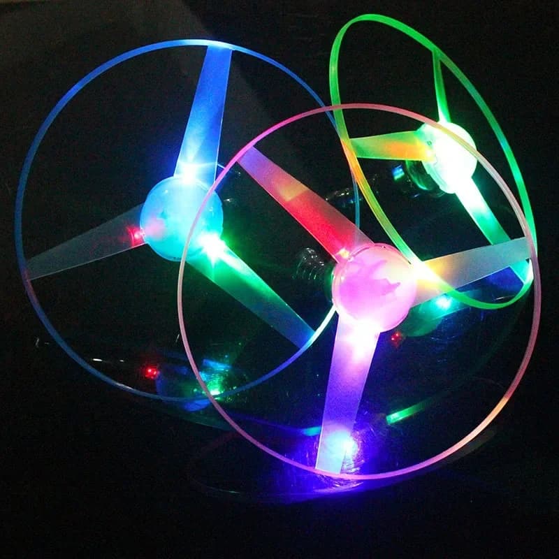Disco volante per bambini con illuminazione a LED, lanciatore di corde colorato stile mosca notturna, filatura con luci lampeggianti per feste in spiaggia nel parco