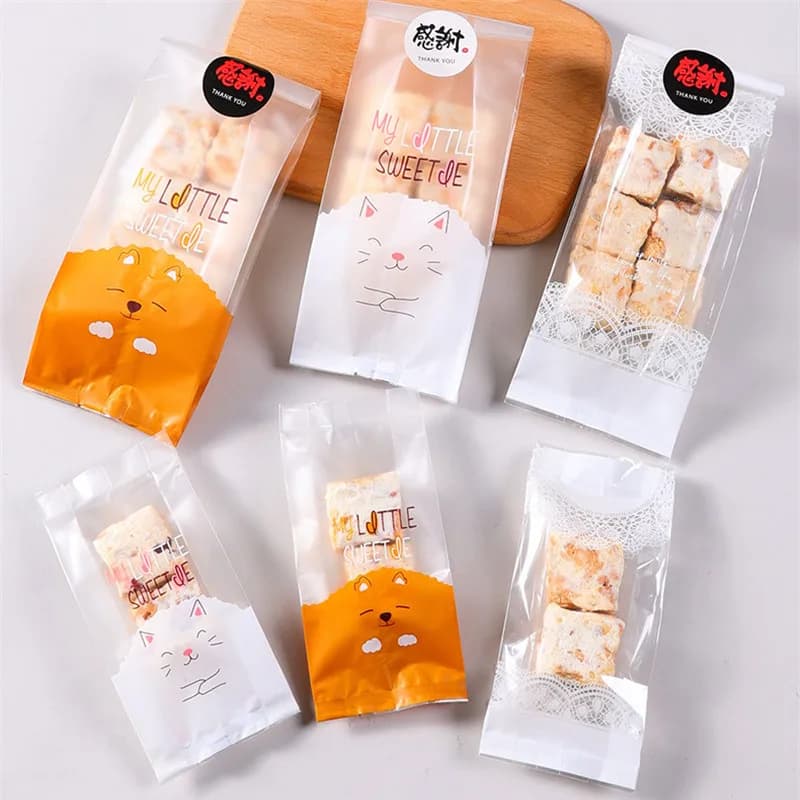 50Pcs pizzo trasparente cartone animato animale al forno Snack caramelle biscotto torrone fiocco di neve pasticceria macchina sigillatura sacchetti di imballaggio