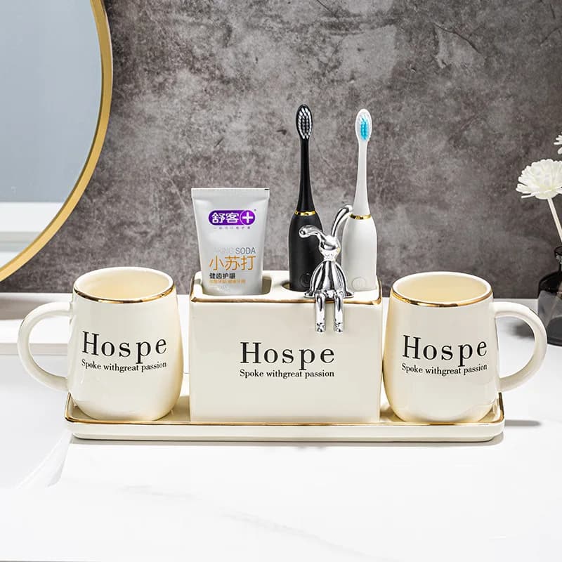 Set of rabbit ceramic washing cups, pair of toothbrushes, toilet, bathroom, electric toothbrush holder