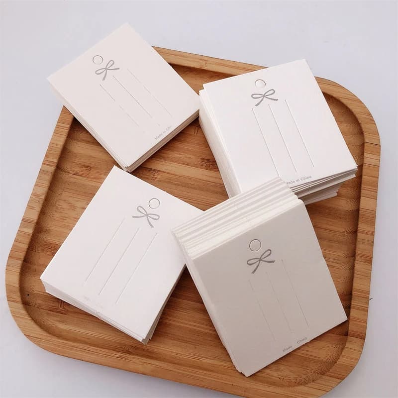 Carta per fermaglio per capelli con fiocco carta per imballaggio di gioielli carta per esposizione di carta per collane bracciali orecchini borchie imballaggio di cartone