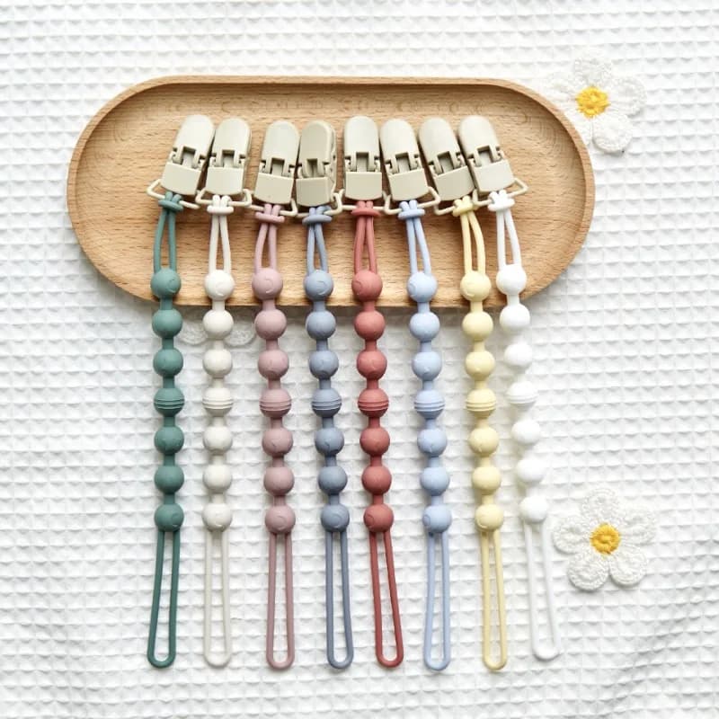 Nuovo colore solido catena in silicone ciuccio per bambini catena di gomma morso musica denti molatura bastone giocattolo corda anti-perdita accessori per neonati