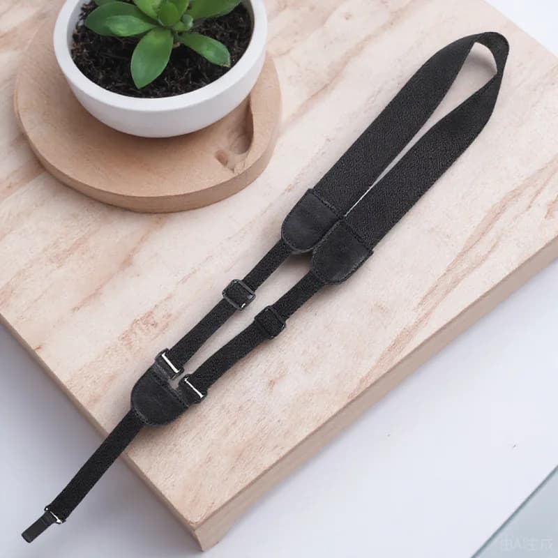 Comoda tracolla per ukulele in nylon, regolabile, adattabile, pieghevole, design compatto, texture resistente, lavabile.