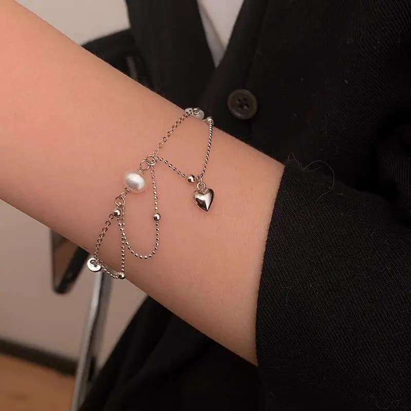 braccialetti magnetici di fascia alta a forma di cuore con perle a doppio strato lucide in argento 925 per gioielli da donna squisiti di lusso leggeri