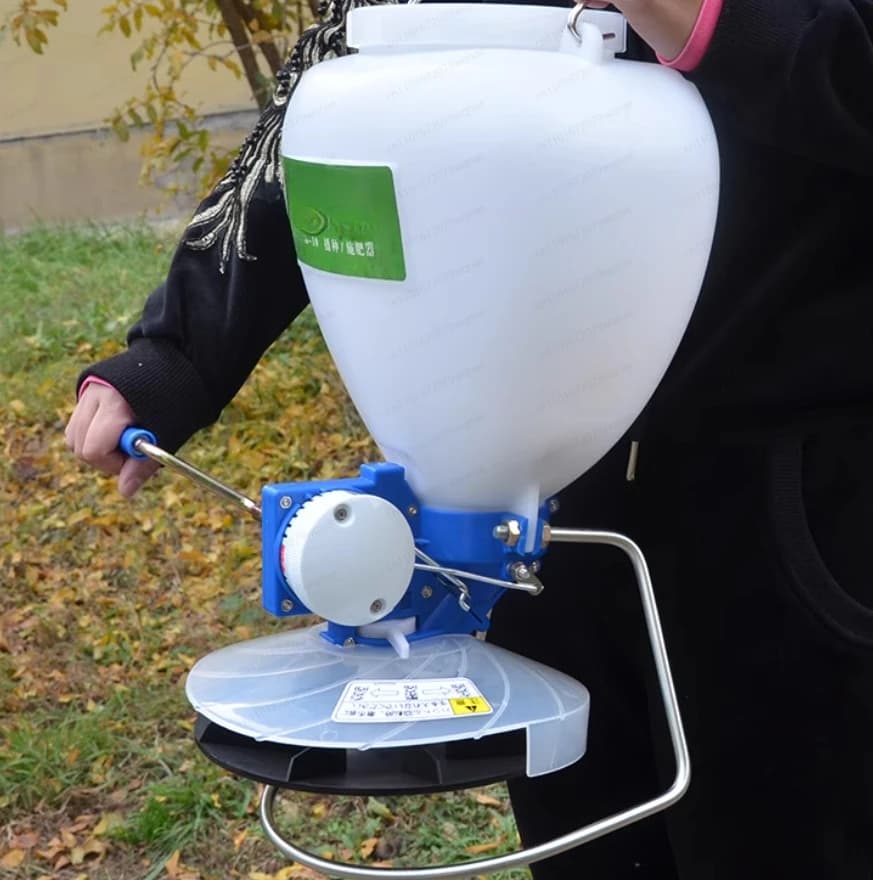 Seeder, sowing machine for grass seeds, seed fertilization device