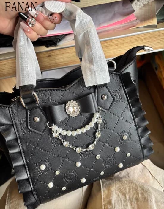 Borsa tote Lolita per ragazze 2025 Nuova borsa carina con perle Strass Borse a mano da donna Borsa a tracolla singola con nodo a farfalla
