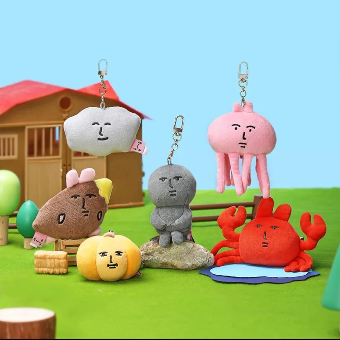 Nuovi giocattoli di peluche di coniglio rosa Peluche Divertente figura di pietra Ciondolo bambola Portachiavi carino Ciondolo zaino per regali di compleanno per bambini