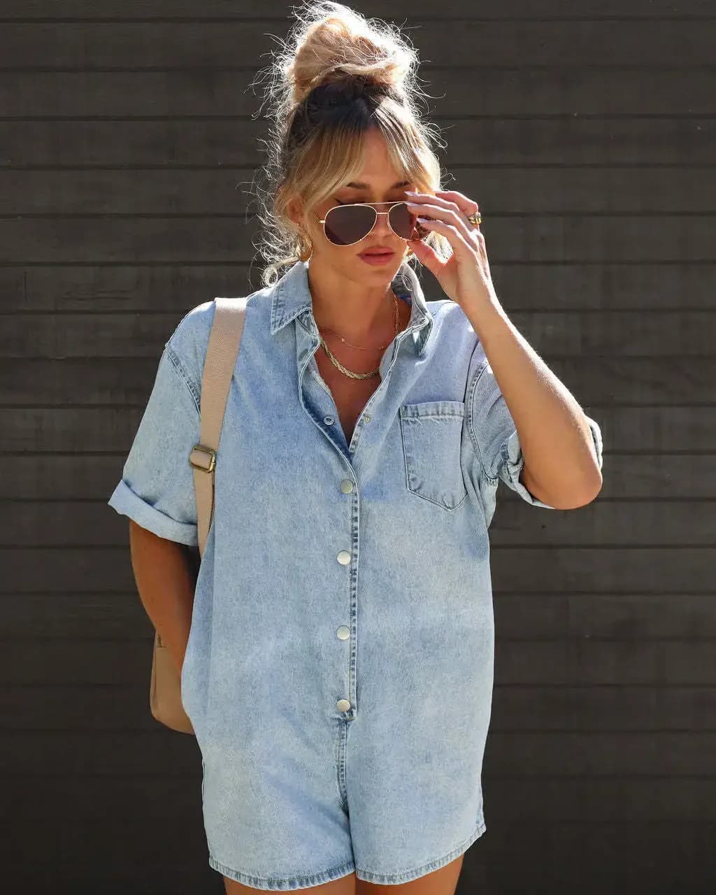 Tuta in denim con risvolto New Street Fashion in Europa e negli Stati Uniti. Pagliaccetto corto a maniche corte ampio primaverile ed estivo da donna