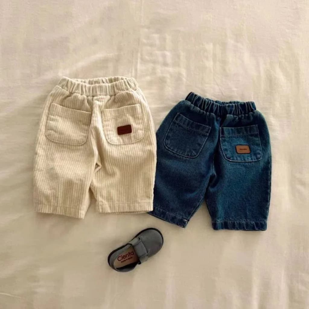 2025 Autunno Nuovo Bambino Jeans Allentati Ragazze Pantaloni di Velluto a Coste Solido Ragazzi Tasca Pantaloni Casual Infantile Del Bambino Versatile Pantaloni In Denim