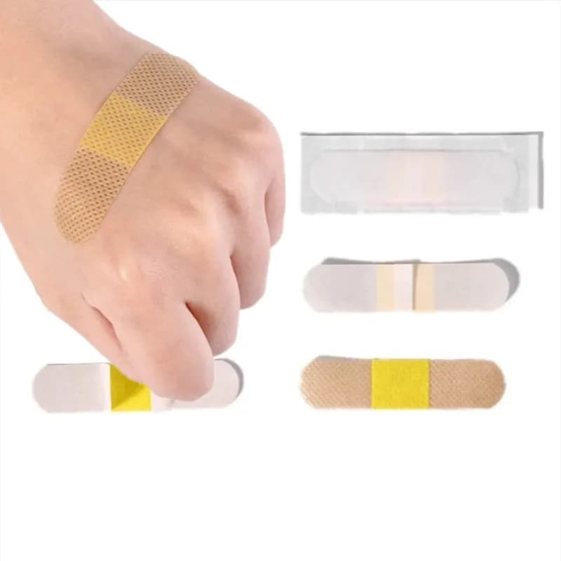 100 Pz/set Non tessuto Cerotto Traspirante Medicazione Della Ferita Patch Bende Adesive Gesso Viaggio A Casa Kit di Primo Soccorso Forniture