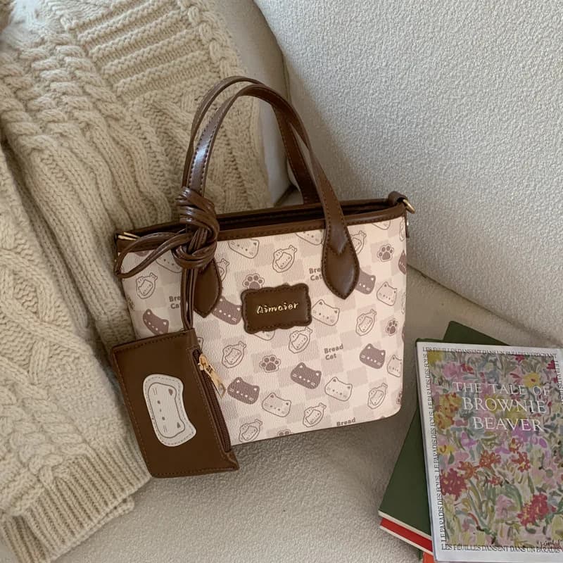 2025Borsa carina alla moda di Capodanno per donna, borsa di fascia alta, borsa a secchiello versatile casual, borsa a tracolla