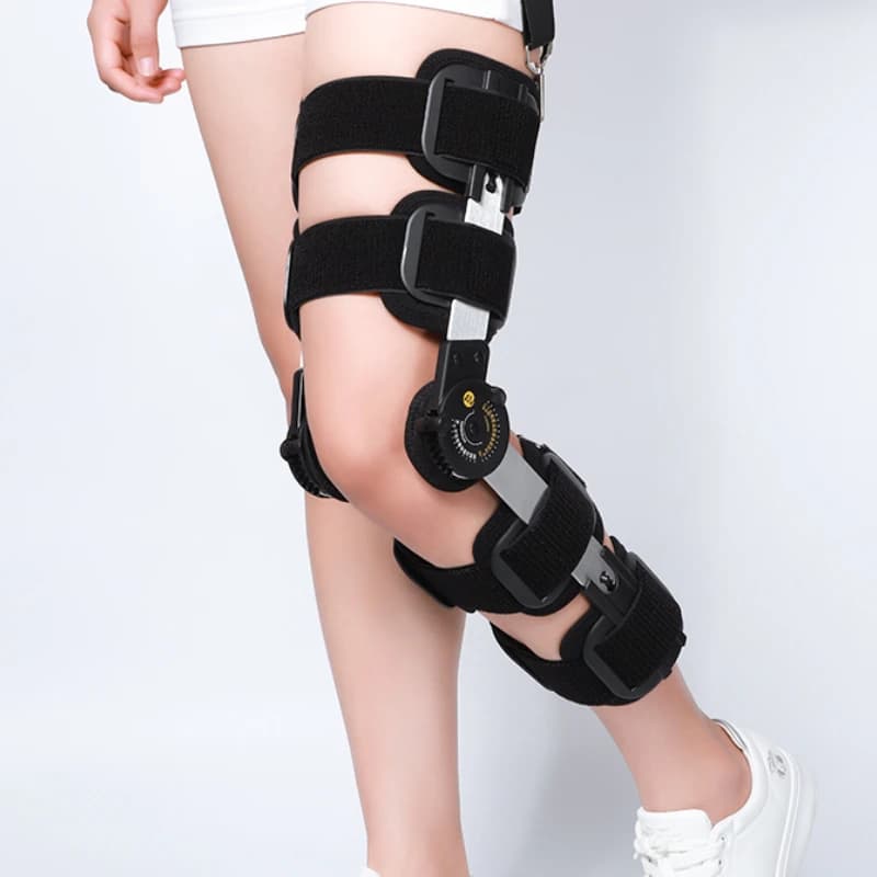 Ginocchiera medica regolabile per il recupero delle fratture, supporto rotuleo traspirante con cinghie di bloccaggio, ortesi post-chirurgia