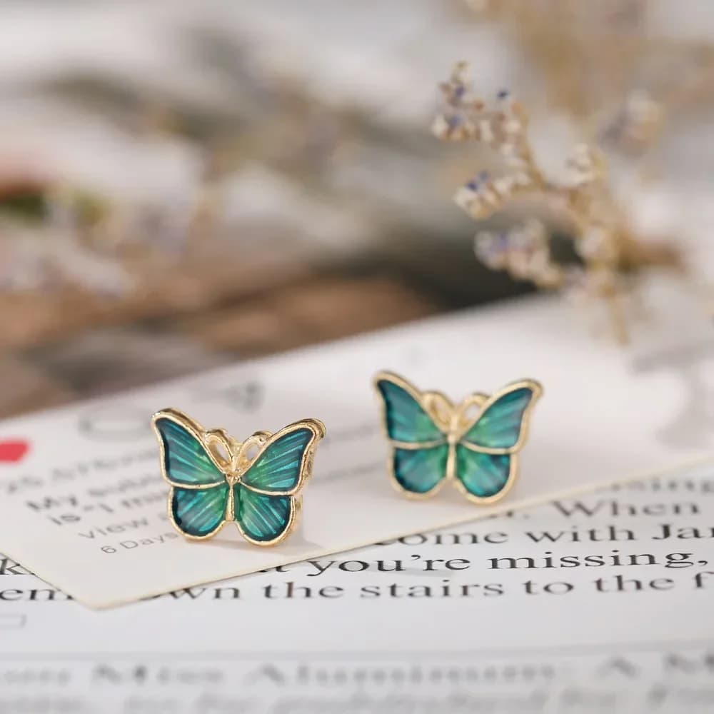 Orecchini di temperamento di fascia alta e alla moda Accessorio Clip per orecchio a farfalla con goccia d'olio di lusso leggera in stile coreano senza foro per l'orecchio
