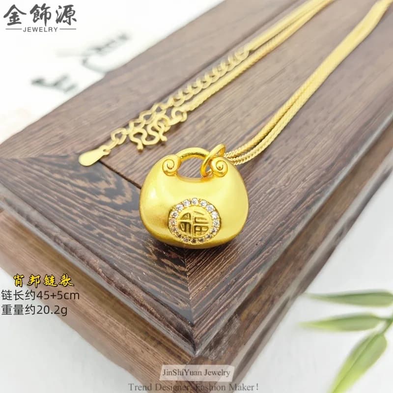 2026 Diamond-encrusted Little Fat Fu Little Golden Lump Pendant; Copper Gold-plated Fu Character Lock Bag Pendant Wholesale