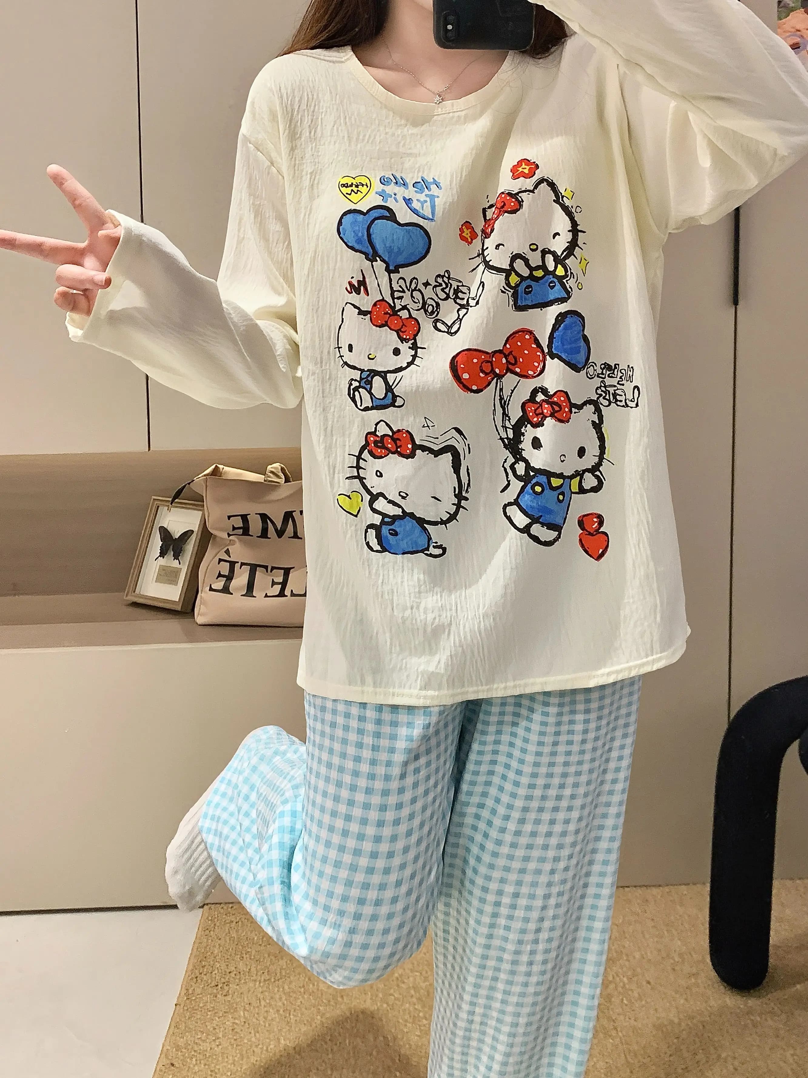 Pigiama da donna Hello Kitty in cotone Cloud con reggiseno integrato, maniche lunghe e pantaloni, per casa e relax, autunno/inverno