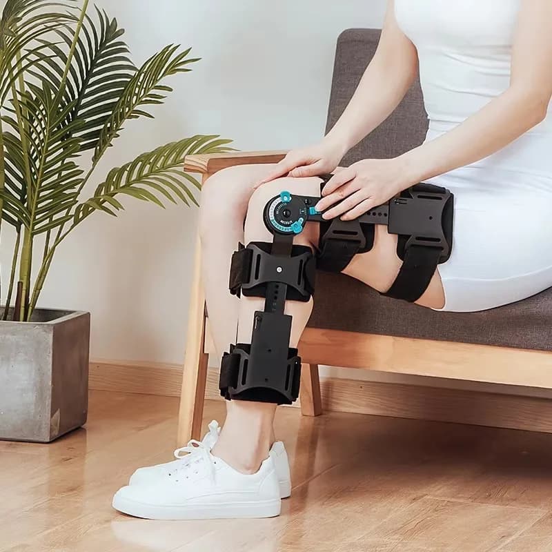 Supporto per ginocchio regolabile Tutore per gamba Supporto per ginocchiera ortopedico con cinghie regolabili Ginocchiera con cerniera Mandrino blu