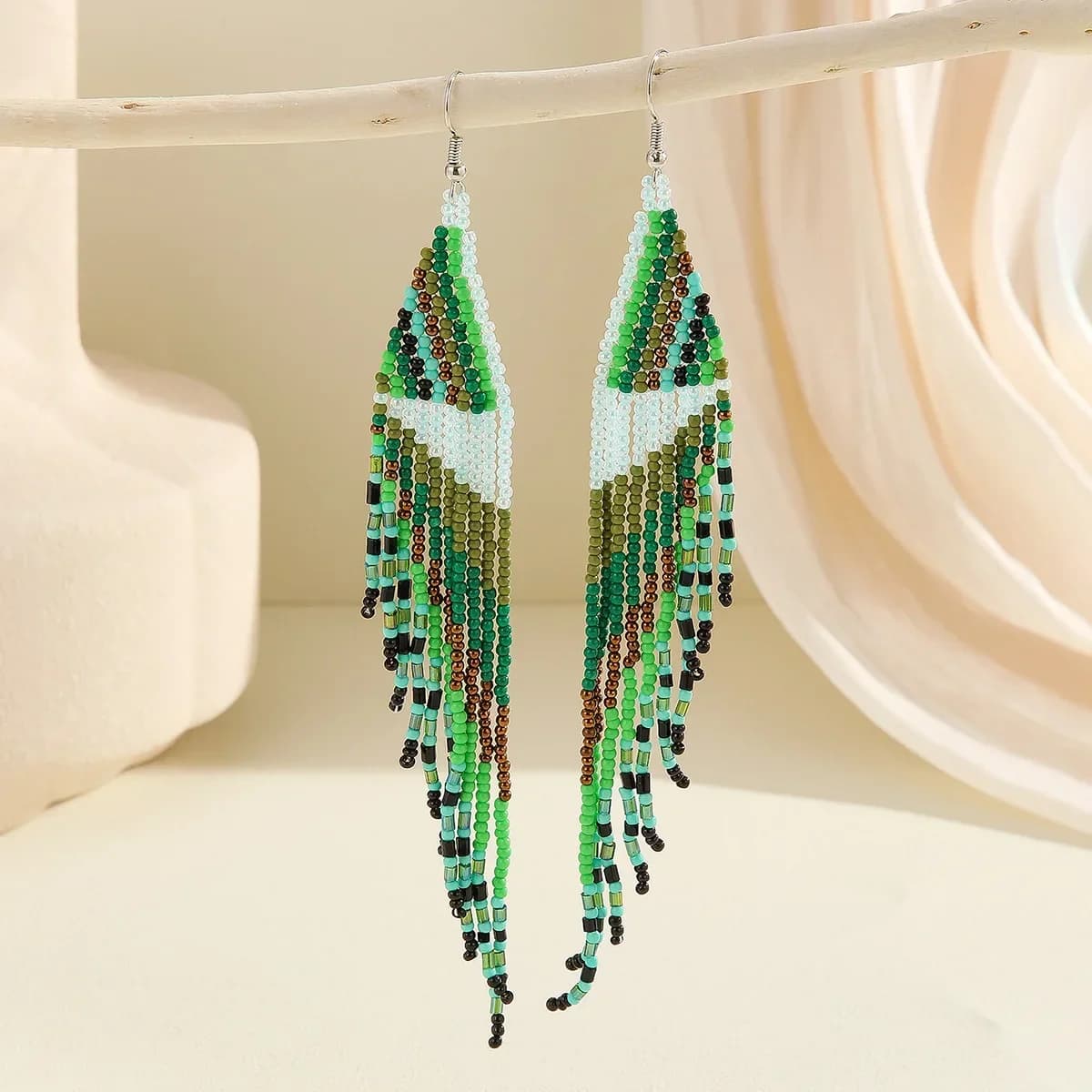 ZGMXR Rice bead earrings Tassel Retro Tide Hand knitting Alloy Bohemia Design Originality Symmetry Heart Female Beaded earrings