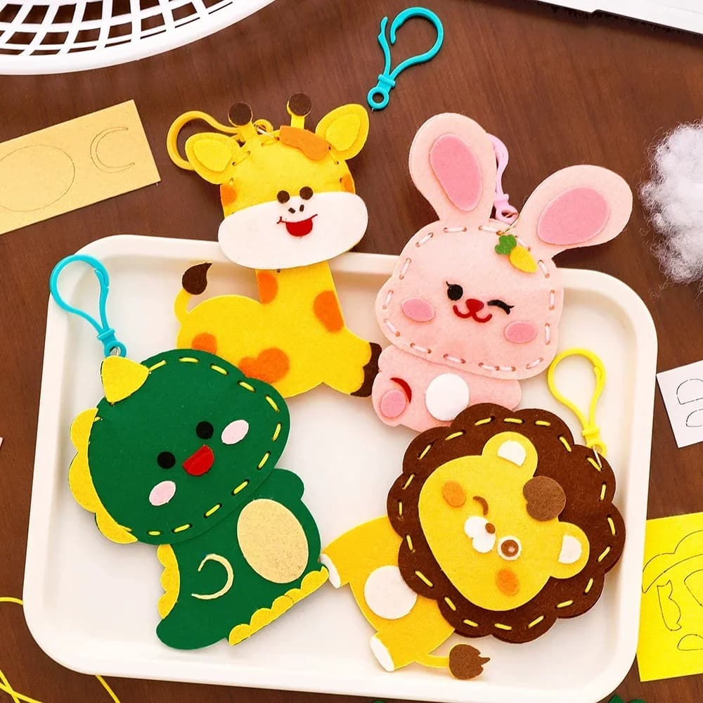 4 pezzi cartone animato animale coniglio dinosauro portachiavi non tessuto fai da te kit da cucito ornamento per bambini bomboniere per feste di compleanno regalo premi scolastiche