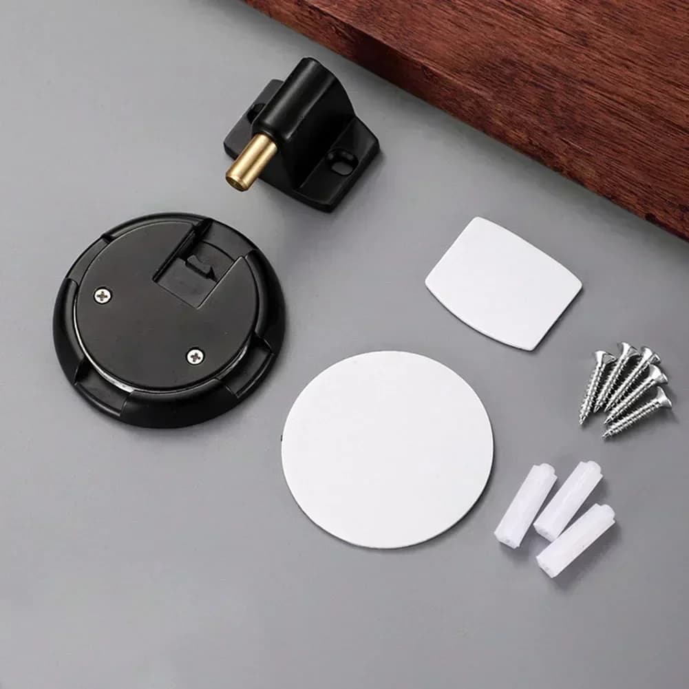 Fermaporta dal design efficiente in lega di zinco, azionato meccanicamente, con doppie opzioni di installazione disponibili