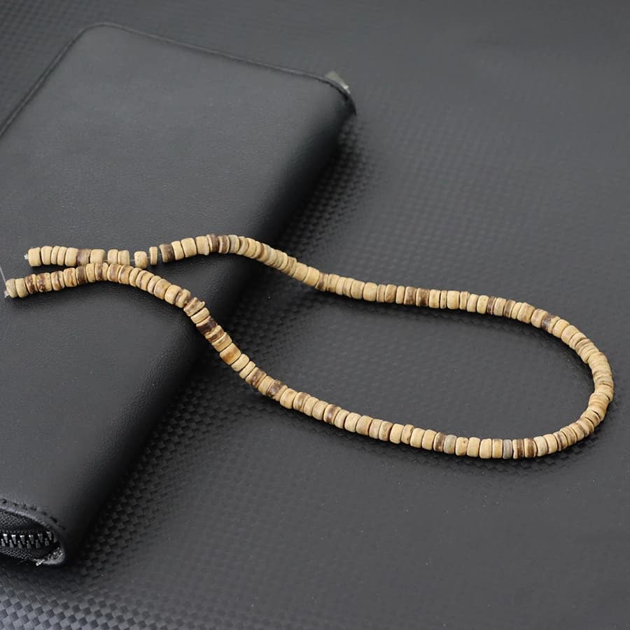 Nuovo commercio all'ingrosso perline di legno naturale per la creazione di gioielli 4 colori buccia di cocco collana fai da te braccialetto borsa di perline orecchini 15 pollici