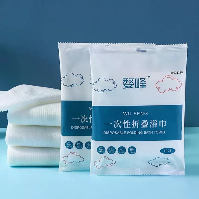 Asciugamano da bagno usa e getta Asciugamano compresso grande Asciugamano da viaggio portatile in cotone ispessito confezionato singolarmente Asciugamano da bagno per hotel