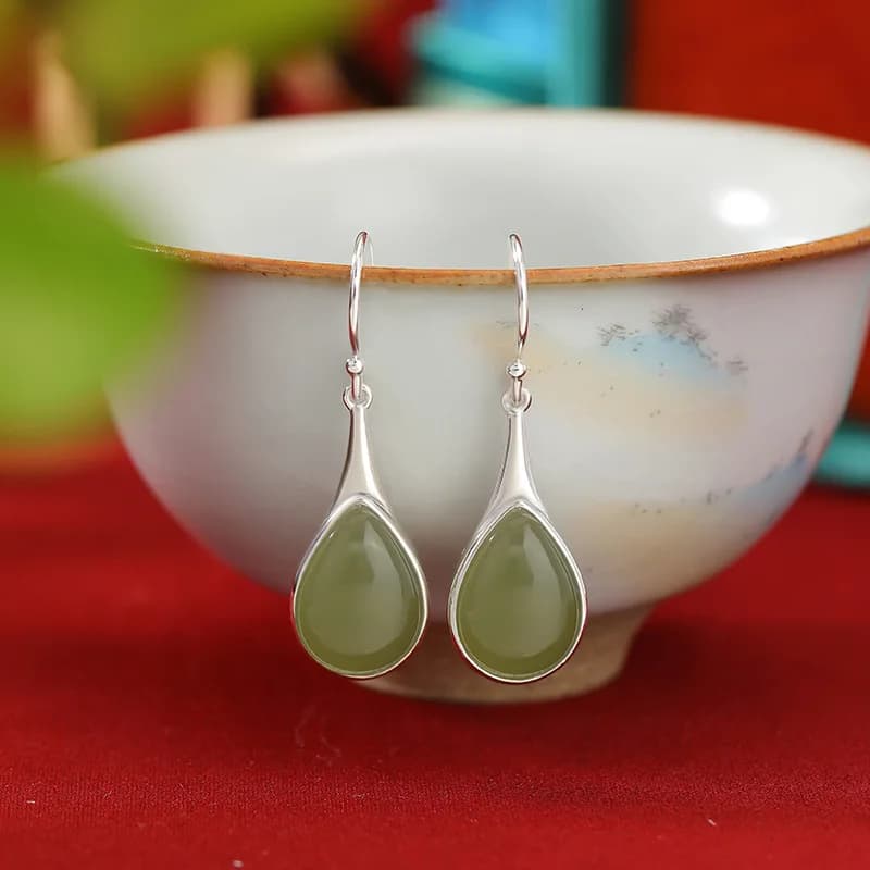 S925 Hetian Jade Vintage Arabesque Pattern Hollow Drop Earrings With Silver Ear Hooks
