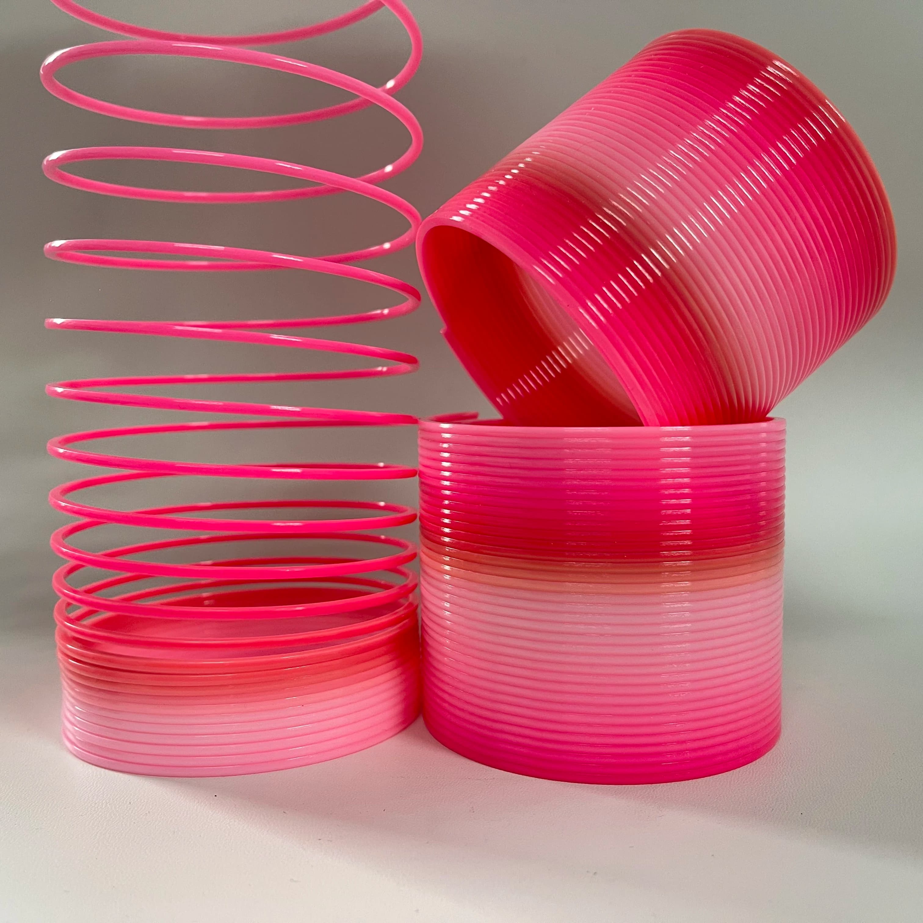 Giocattolo a Molla Arcobaleno Magico Rosa Sfumato (1/3/6 Pezzi), Giocattolo Elastico a Spirale in Plastica, Gadget Creativi per Feste per Bambini