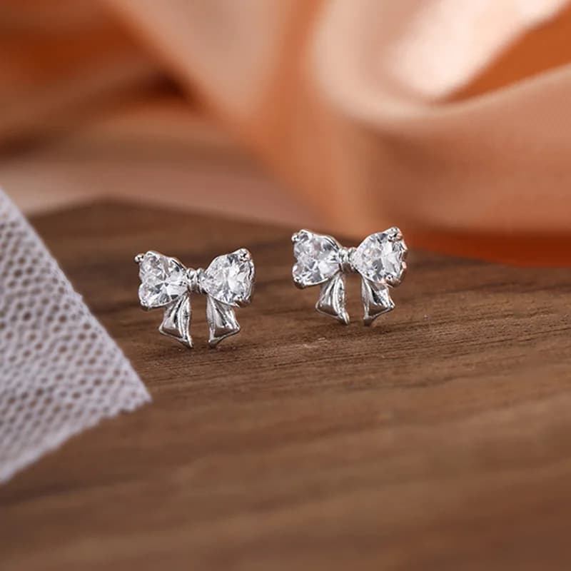 Reale 925 Sterling Silver Zircone Irregolare Bowknot Mini Orecchini con perno Per Le Donne Classici Gioielleria Raffinata Piccoli Accessori di Nicchia