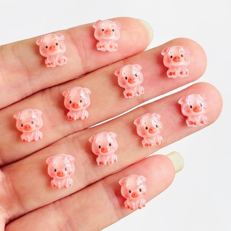 60 pieces of cartoon mini pig nail resin jewelry DIY production nail 3D decoration jewelry A152