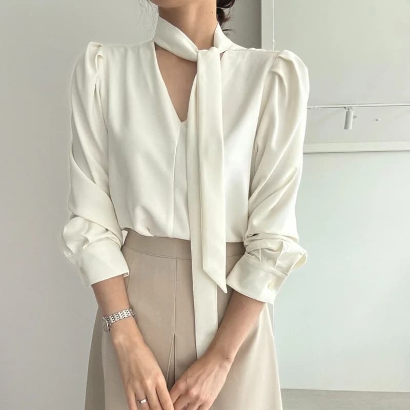 Abito da donna in stile coreano con gonna a pieghe a vita alta e top alla moda con scollo a V, completo primaverile/estivo, ideale per il lavoro, a maniche lunghe